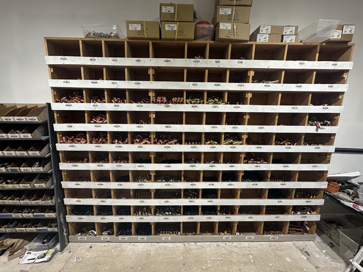 Organized warehouse with labeled bins